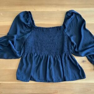 Adorable smocked, peplum, silky puff sleeve top from Gap